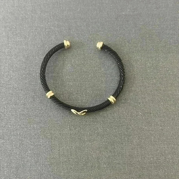 Black enamel bracelet with gold detail - Picture 1 of 3